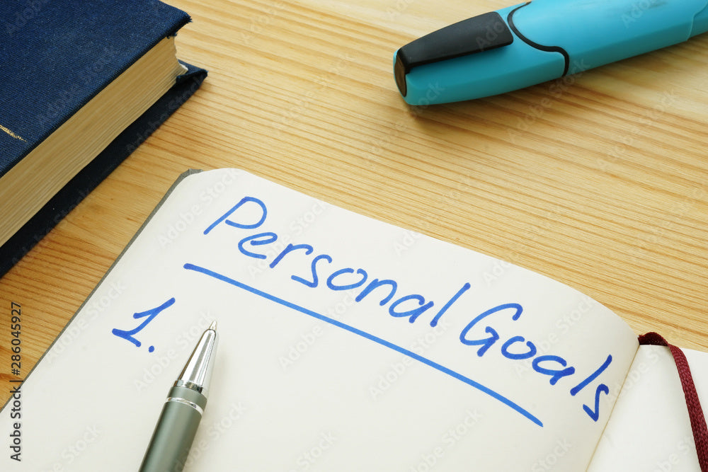 Personal goals list in the diary and pen.